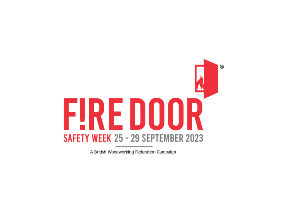 Fire door with safety sign promoting fire safety awareness during Fire Door Safety Week 2023.