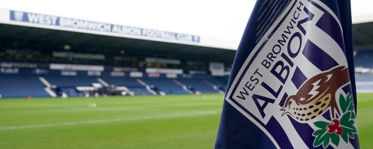 Fire safety advisors logo at West Bromwich Albion football stadium, promoting fire safety awareness.