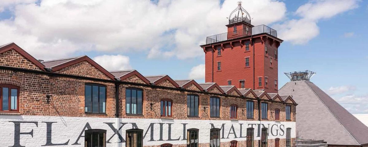 Fire safety advisors inspecting historic maltings building for fire risk prevention.