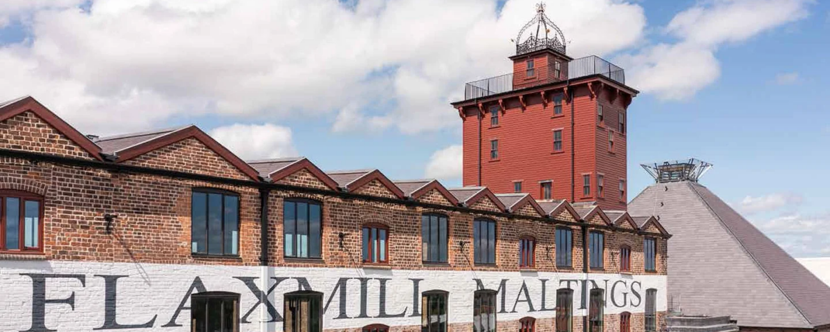 Fire safety advisors inspecting historic maltings building for fire risk prevention.